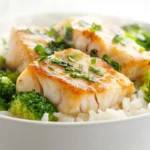 Someone is enjoying a cod fish dinner with broccoli and rice, showing its appeal in real life